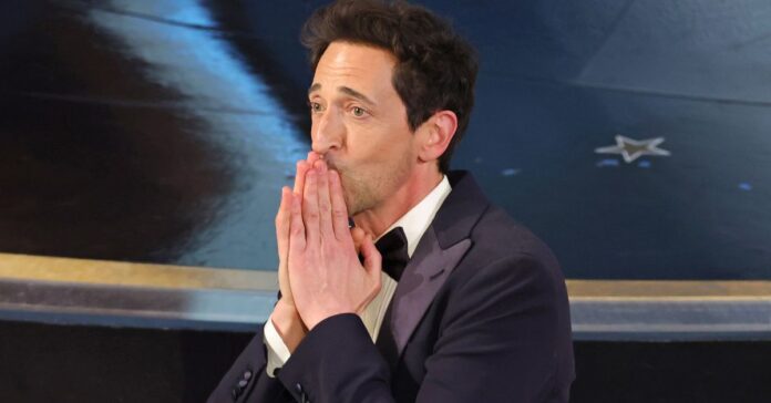 Adrien Brody's girlfriend Georgina Chapman defends moment he threw gum at her during 2025 Oscars
