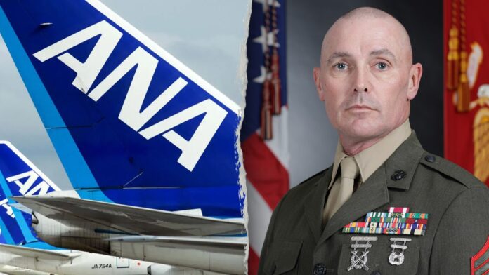 Marine restrains man who tried to open emergency exit on flight: report
